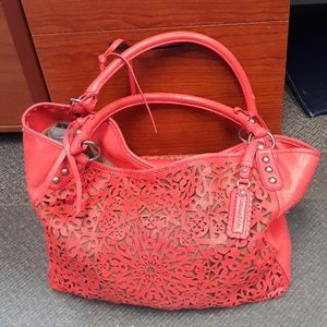 Red cutout leather Isabella Fiore hobo bag